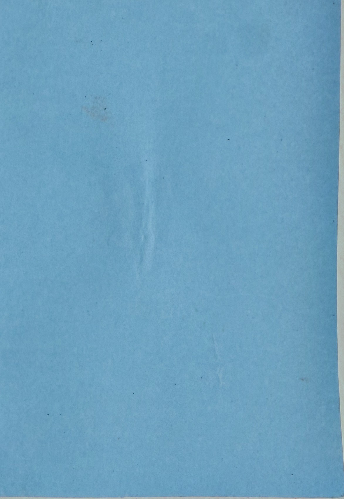 The journal's blue cover, bound with a coral spiral